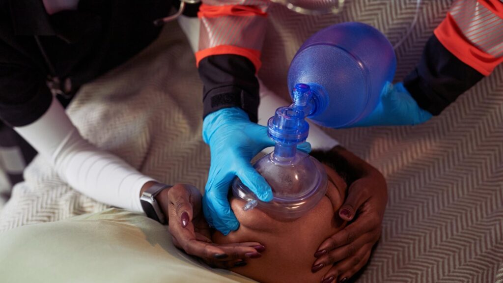 woman receiving ventilation after opioid overdose