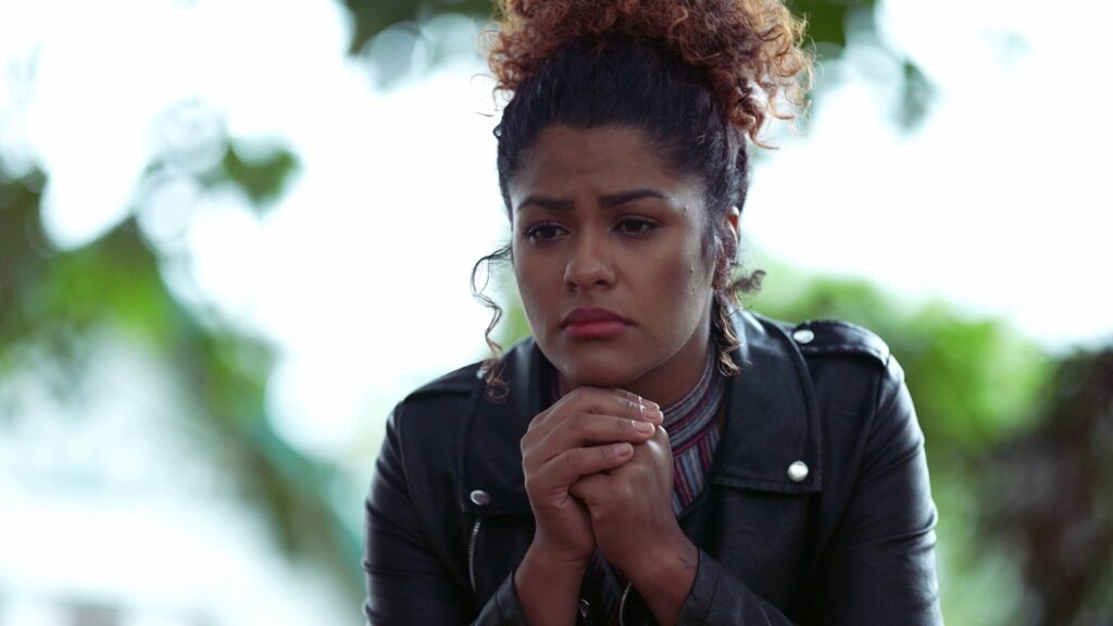 Woman reflecting on the connection between alcohol use and anxiety