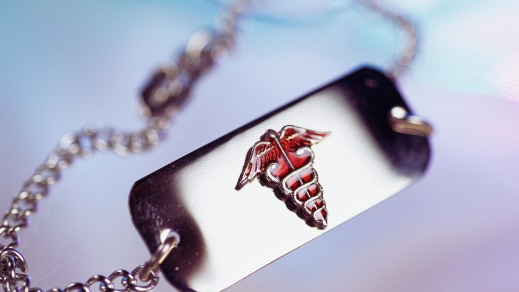 Medical alert bracelet indicating opioid-blocking medication use